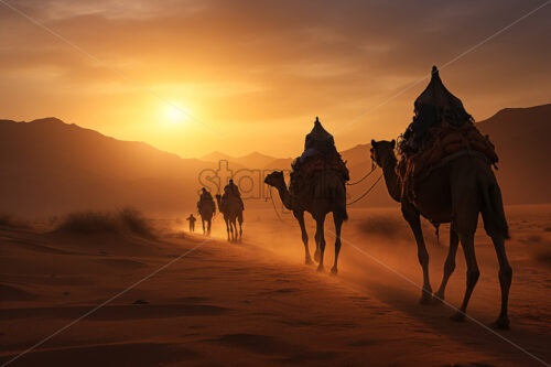 A caravan of camels crossing a desert - Starpik Stock