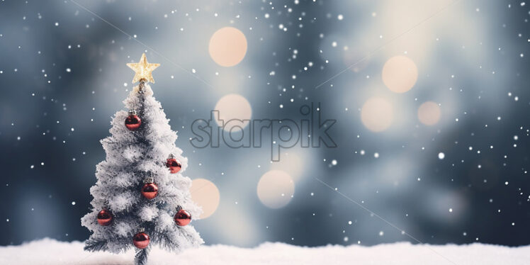 A decorated Christmas tree in miniature on the snow - Starpik Stock