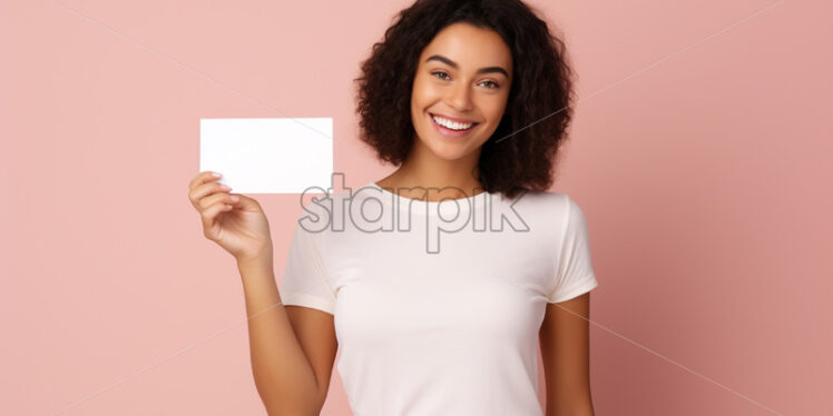 A girl holds a white sheet in her hand - Starpik Stock