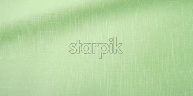 A light green linen paper texture background - Starpik Stock