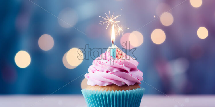 A muffin with a candle - Starpik Stock