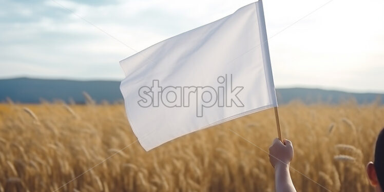 A person holding a white flagellum in his hand - Starpik Stock