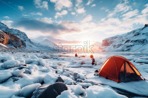 A tent on the shore of a frozen glacial lake - Starpik Stock