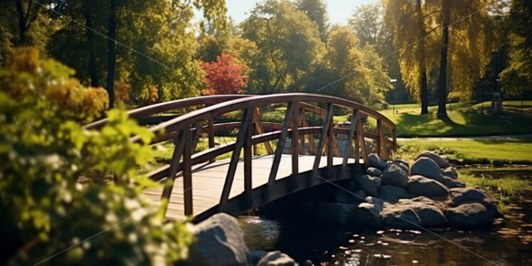 A wooden bridge in autumn in the park - Starpik Stock