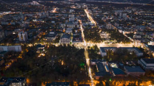 Aerial drone hyperlapse timelapse of Chisinau city center at sunset. Parliament, Presidency, Nativity Cathedral and Triumphal Arch buildings. Moldova - Starpik Stock