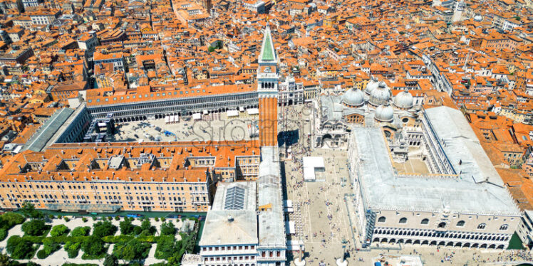 Aerial drone view of Venice, Italy. Historical city centre with St Mark’s Square and other old buildings and narrow streets - Starpik Stock