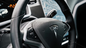 CHISINAU, MOLDOVA – JANUARY, 2022: Tesla Model S P90 interior. Steering wheel and displays showing information - Starpik