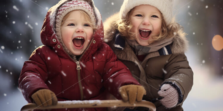 Children riding a sleigh having fun outdoors during winter seasons - Starpik