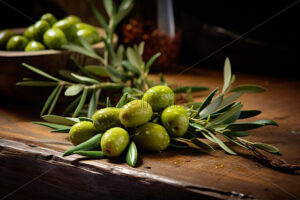 Fresh green olives on a wooden table - Starpik Stock