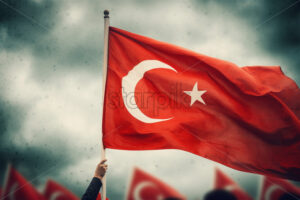 Generative AI a hand holding the Turkish flag and several flags in the background - Starpik Stock