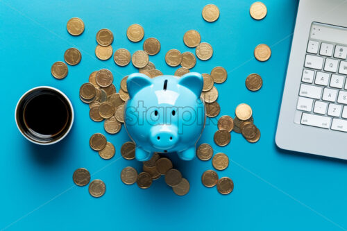 Generative AI a piggy bank with money on a blue surface - Starpik Stock