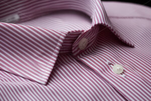 Generative AI the texture and collar of a checkered shirt - Starpik Stock