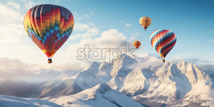 Hot air balloons fly over snowy mountains - Starpik Stock