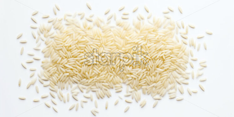 Rice on a white surface - Starpik Stock