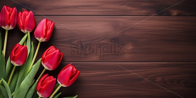 Tulip flowers on a wooden surface - Starpik Stock