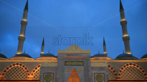 View of the Camlica Mosque in Istanbul at evening, Turkey. Facade made of white stone, illumination - Starpik Stock