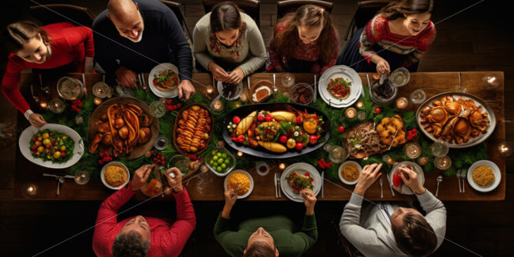 family at the table celebrating holiday top views - Starpik Stock