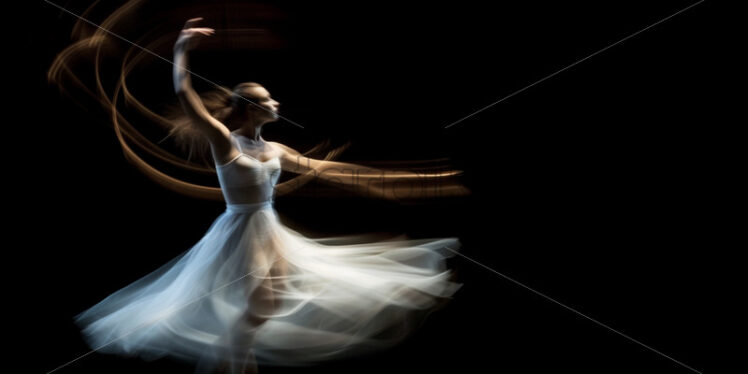 A ballerina dancing, motion blur - Starpik Stock