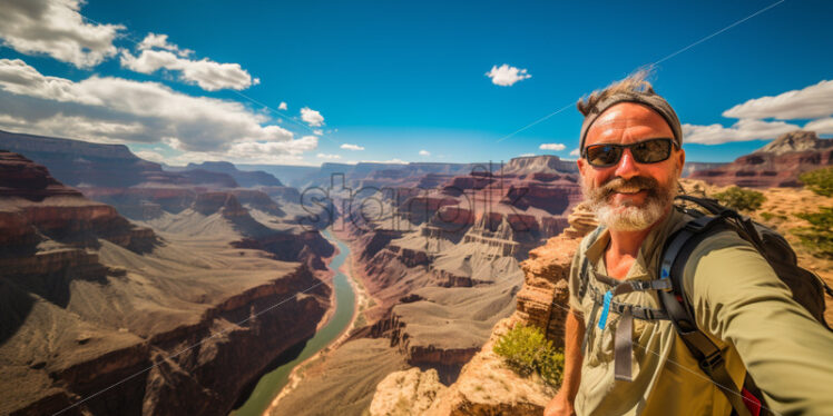 A breathtaking panoramic view of the iconic Grand Canyon in the Arizona desert - Starpik Stock