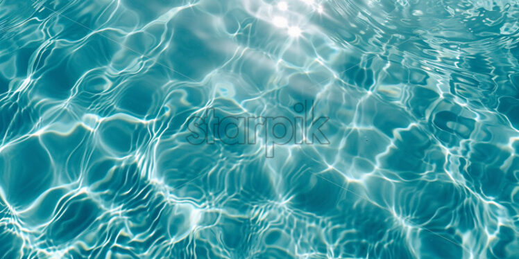 A detailed image showcasing the crystal-clear water of a pool, highlighting its refreshing - Starpik Stock