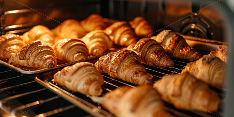 Croissants that are baked in the oven - Starpik Stock