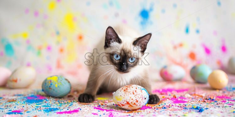 Easter postcard with siamese cat surrounded by spilled paint and half-painted easter eggs - Starpik Stock