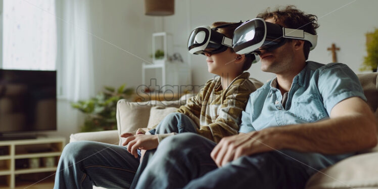 Father and son playing with VR glasses - Starpik Stock