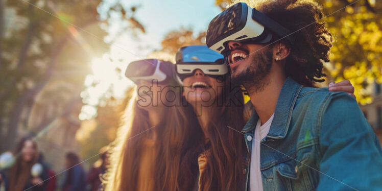 Friends having fun outdoors with VR glasses - Starpik Stock