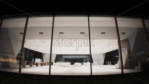 Modern building at night for celebrations and white tables - Starpik Stock