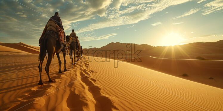 Nomad's desert journey with camels - Starpik Stock