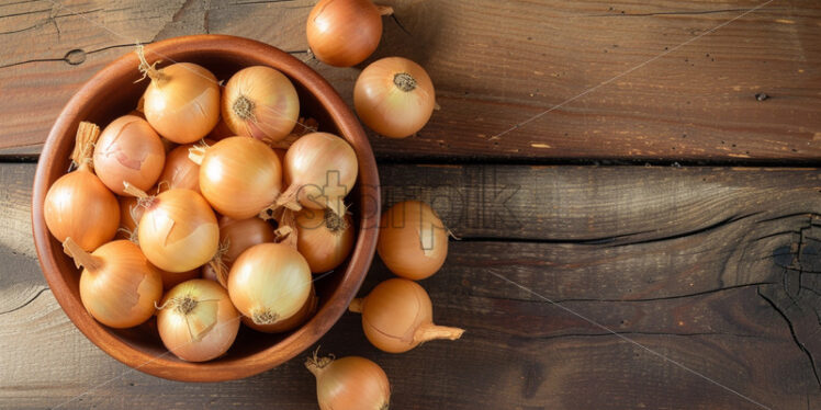 Onions in a wooden bowl on a table - Starpik Stock