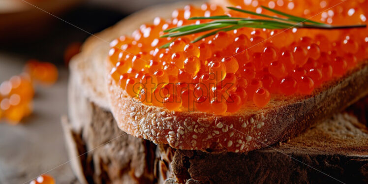 Red caviar on a toast - Starpik Stock