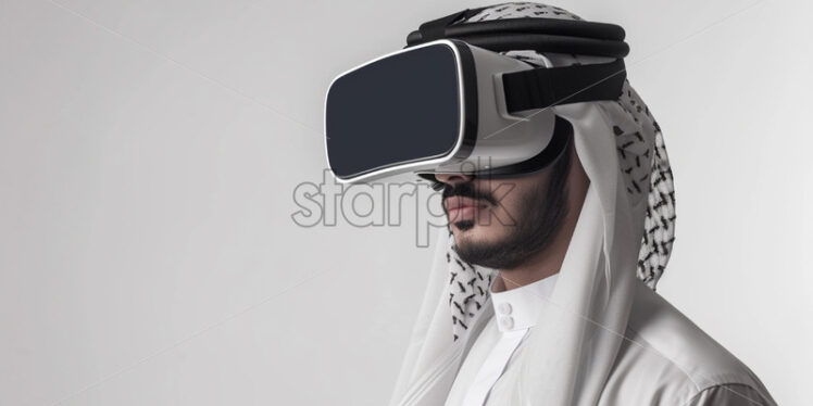 Saudi youth male using VR glasses - Starpik Stock