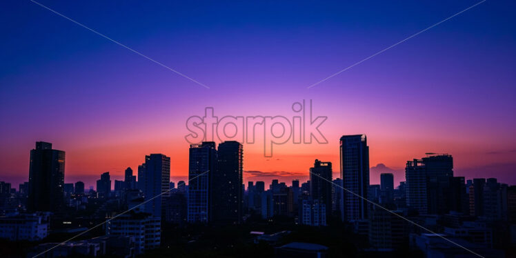 Sunset over a beautiful city - Starpik Stock