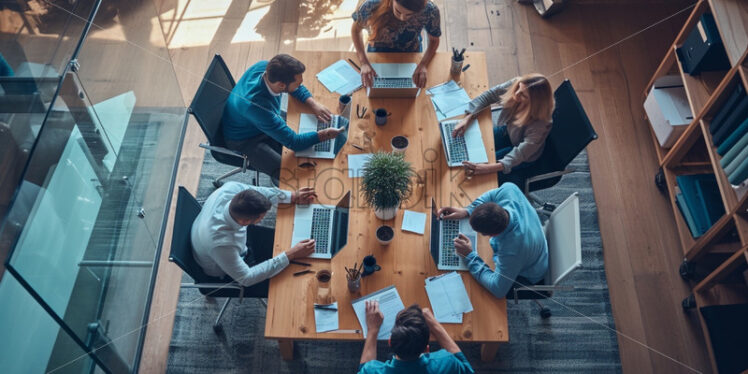 Team working in an office top view - Starpik Stock