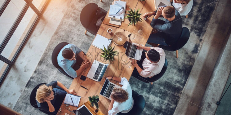 Team working in an office top view - Starpik Stock