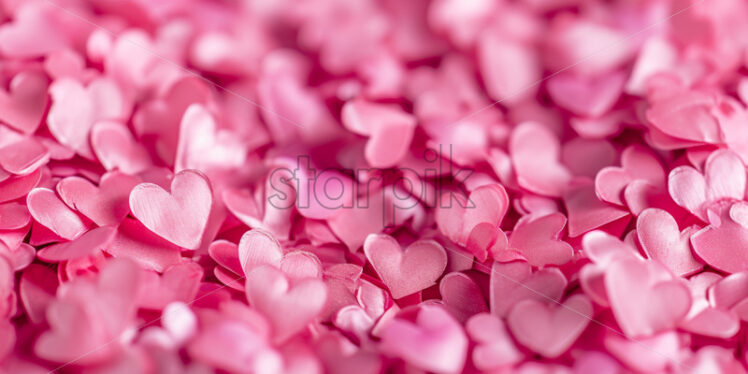 Valentine's Day postcard with many small pink hearts on white background - Starpik Stock