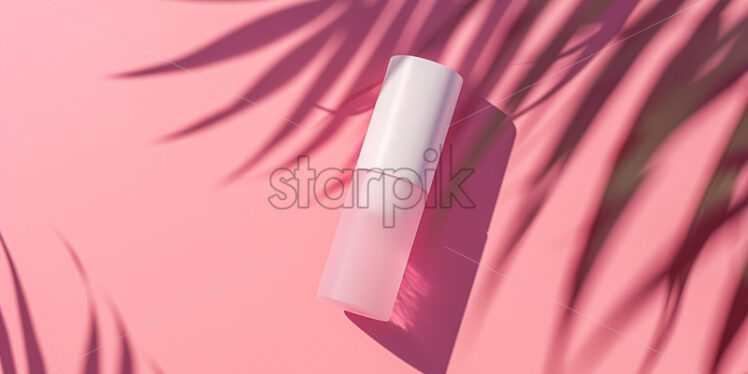 White blank lip balm chapstick on a light pink background - Starpik Stock