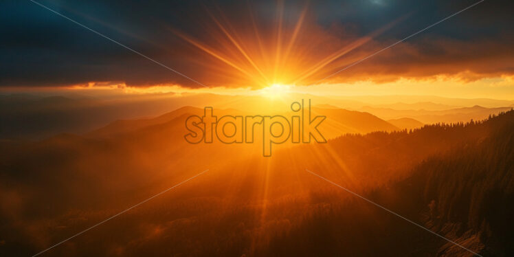 A sunrise over the mountains - Starpik Stock