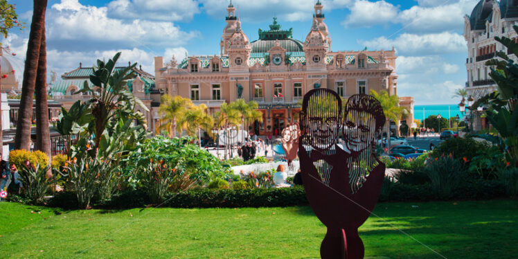 Man and woman sculpture in front of The Monte Carlo Casino - Starpik Stock