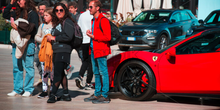 Red Ferrari on the street - Starpik Stock