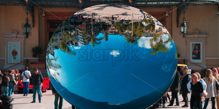 Sky mirror sculpture in front of The Monte Carlo Casino - Starpik Stock