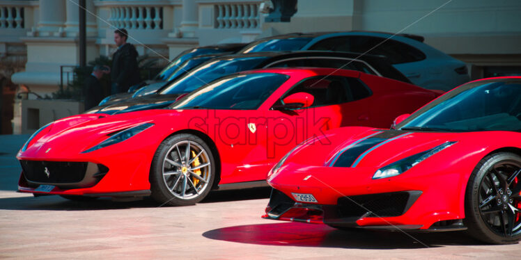 Two red Ferrari cars - Starpik Stock