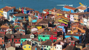 VIDEO Aerial drone view of the colourful houses of Burano Island, Italy - Starpik