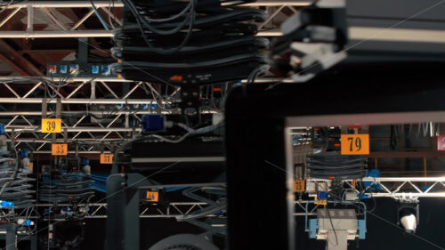 VIDEO Close up of studio lights equipment on the ceiling of a TV set - Starpik