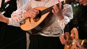 VIDEO Close-up of three women playing the mandolin - Starpik