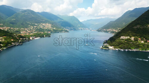 VIDEO Aerial, drone view of Como, Italy on the shore of Lake Como - Starpik