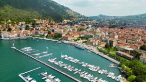 VIDEO Aerial, drone view of a harbor on Lake Como in Como, Italy - Starpik