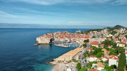 VIDEO Aerial, drone view of buildings on the shore of the Adriatic sea in Dubrovnik, Croatia - Starpik