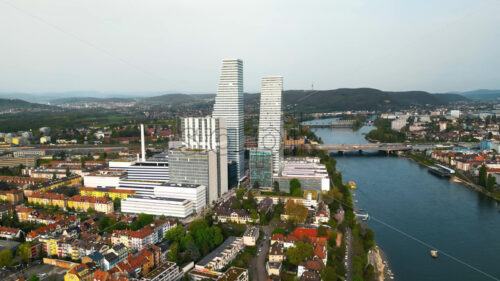 VIDEO Aerial, drone view of the Roche Tower (Building 1) in Basel, Switzerland - Starpik